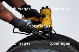 A mechanic works on a Pirelli tyre. 19.04.2024. Formula 1 World Championship, Rd 5, Chinese Grand Prix, Shanghai, China, Sprint Qualifying Day.