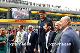L to R): Stefano Domenicali (ITA) Formula One President and CEO with Yao Ming (CHN) Former Basketball Player, and Mohammed Bin Sulayem (UAE) FIA President on the grid. 21.04.2024. Formula 1 World Championship, Rd 5, Chinese Grand Prix, Shanghai, China, Race Day.