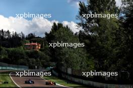 (L to R): Esteban Ocon (FRA) Alpine F1 Team A524 and Lando Norris (GBR) McLaren MCL38. 17.05.2024. Formula 1 World Championship, Rd 7, Emilia Romagna Grand Prix, Imola, Italy, Practice Day.