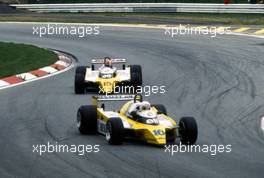 Rene Arnoux (FRA) Renault RE20 Equipe Renault Elf leads Jean Pierre Jabouille (FRA) same car