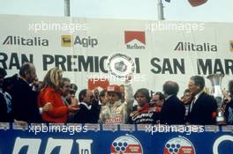 Gilles Villeneuve (CDN) Ferrari 126 C2 2nd position celebrate podium