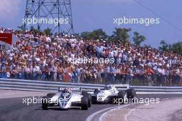 Nelson Piquet (BRA) Brabham BT50 Bmw leads Keke Rosberg (FIN) Williams FW 08 Ford Cosworth