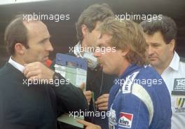 Keijo Erik Keke Rosberg (FIN) Williams FW 08 Ford Cosworth 1st position and world champion talks with Frank Williams