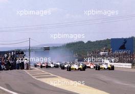 Alain Prost (FRA) Renault R30B Turbo leads the group at start