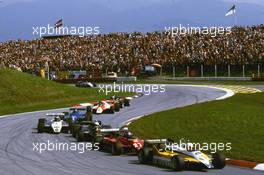 Rene Arnoux (FRA) Renault R30B lead a group