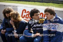 Michele Alboreto (ITA) Tyrrell talks with Eddie Cheever (USA) Talbot Ligier