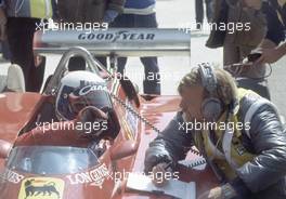 Didier Pironi (FRA) Ferrari 126 C2 1st position talks with Eng Tommaso Carletti