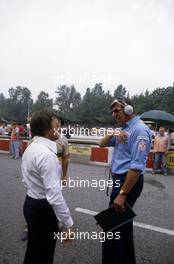 Bernie Ecclestone (GBR) talks with Ken Tyrrell (GBR)