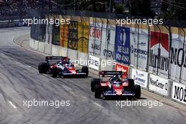 Derek Warwick (GBR) Toleman TG 183B leads Bruno Giacomelli (ITA) same car