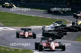 Rene'Arnoux (FRA) Ferrari 126 C2B 3rd position leads teammate Patrick Tambay (FRA) 1st position at Acque Minerali corner