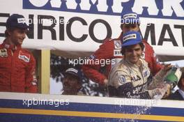 Nelson Piquet (BRA) Brabham 1st position,Rene Arnoux (FRA) Ferrari 2nd position and Eddie Cheever (USA) Renault 3rd position celebrates podium