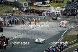 Vern Schuppan (AUS) Hurley Haywood (USA) Al Holbert (USA) Porsche 956 Turbo CL C Rothmans Porsche 1st position take chequered flag