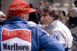 Nelson Piquet (BRA) Brabham talks with Niki Lauda (AUT) McLaren