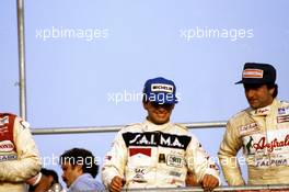 Pierluigi Martini (ITA) Minardi M283 Bmw Minardi Team 2nd position celebrate on podium with Roberto del Castello (ITA) March Bmw 3rd position