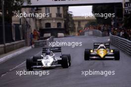 Keke Rosberg (FIN) Williams FW 08C Ford Cosworth leads Alain Prost (FRA) Renault RE 40 3rd position