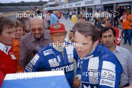 Niki Lauda (AUT) and John Watson (GBR) McLaren on the pitwall