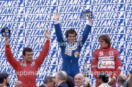 Alain Prost (FRA) Renault 1st position,Patrick Tambay (FRA) Ferrari 2nd position,Eddie Cheever (USA) Renault 3rd position celebrates podium