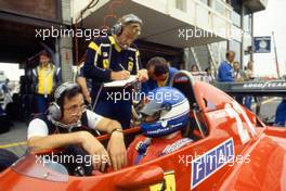 Patrick Tambay (FRA) Ferrari 126 C3 2nd position talks with Mauro Forghieri and Tommaso Carletti