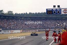 Rene'Arnoux (FRA) Ferrari 126 C3 1st position takes the checkered flag
