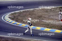 Nelson Piquet (BRA) Brabham through walking the track after crash with Alain Prost (FRA) Renault