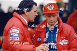 Niki Lauda (AUT) McLaren talks with John Barnard
