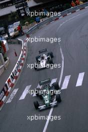 Danny Sullivan (USA) Tyrrell 011 Ford Cosworth leads Jacques Laffite (FRA) Williams FW 08C Ford Cosworth