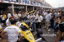 Alain Prost (FRA) Renault RE 40 in the pits