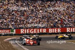 Rene'Arnoux (FRA) Ferrari 126 C3 1st position leads a group