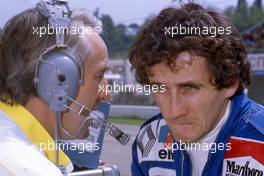 Alain Prost (FRA) Renault 2nd position talks with Gerard Larrousse