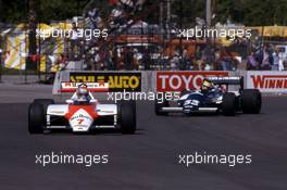 John Watson (GBR) McLaren MP4/1C Ford Cosworth 1st position leads Roberto Guerrero (COL) Theodore N183 Ford Cosworth