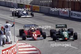 Rene'Arnoux (FRA) Ferrari 126 C2B 3rd position battles with Michele Alboreto (ITA) Tyrrell 011 Ford Cosworth