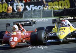 Rene'Arnoux (FRA) Ferrari 126 C3 battles with Eddie Cheever (USA) Renault RE 40 at Druids corner