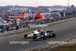 Keke Rosberg (FIN) Williams FW09B Honda battles with Stefan Johansson (SWE) Tyrrell 012 Ford Cosworth