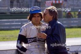 Nelson Piquet (BRA) Brabham talks with Bernie Ecclestone