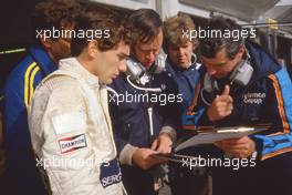 Ayrton Senna da Silva (BRA) Toleman TG 184 Hart talks with Pat Symonds and Rory Byrne