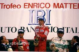 Niki Lauda (AUT) McLaren 1st position Michele Alboreto (ITA) Ferrari 2nd position Riccardo Patrese (ITA) Alfa Romeo 3rd position  3rd position celebrates podium