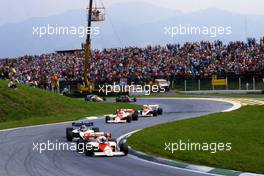 Alain Prost (FRA) McLaren Mp4/2 Tag Porsche lead a group