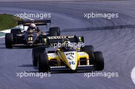 Derek Warwick (GBR)  Renault RE50 leads Elio de Angelis (ITA) Lotus 95T Renault