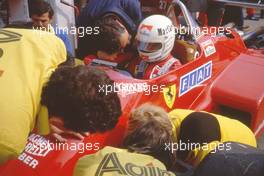 Rene Arnoux (FRA) Ferrari 126 C4 talks with Mauro Forghieri