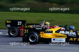 Michele Alboreto (ITA) Ferrari 126 C4 3rd position battles with Gerhard Berger (AUT) Ats D7 Bmw