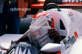 Niki Lauda (AUT) McLaren Mp4/2 Tag Porsche 2nd position and the news paper