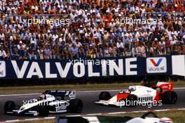 Nelson Piquet (BRA) Brabham BT53 Bmw lead Alain Prost (FRA) McLaren Mp4/2 Tag Porsche 1st position at Sachs Kurve