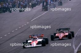 Niki Lauda (AUT) McLaren Mp4/2 Tag Porsche 2nd position leads Michele Alboreto (ITA) Ferrari 126 C4