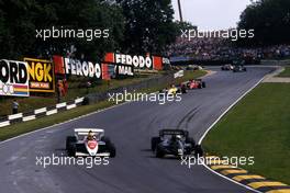 Ayrton Senna da Silva (BRA) Toleman TG 184 Hart 3rd position battles with Elio de Angelis (ITA) Lotus 95T Renault