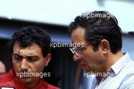 Michele Alboreto (ITA) Ferrari talks with Mauro Forghieri