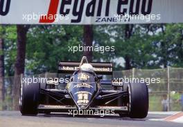 Elio de Angelis (ITA) Lotus 97T Renault 1st position at Variante Alta bend