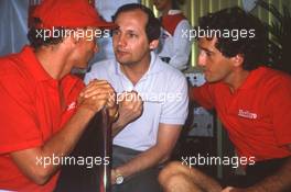 Ron Dennis (GBR) talks with Alain Prost (FRA) and Niki Lauda (AUT) McLaren