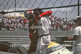 Nigel Mansell (GBR) Williams FW 10 Honda after crash during race