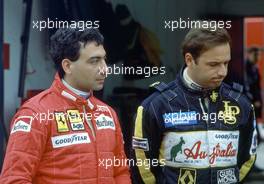 Michele Alboreto (ITA) Ferrari and Elio de Angelis (ITA) Team Lotus