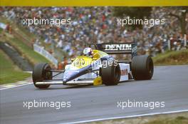 1985 European Grand Prix. Brands Hatch, England. 4-6 October 1985.  Nigel Mansell (Williams FW10 Honda) 1st position at Druids Hairpin.
